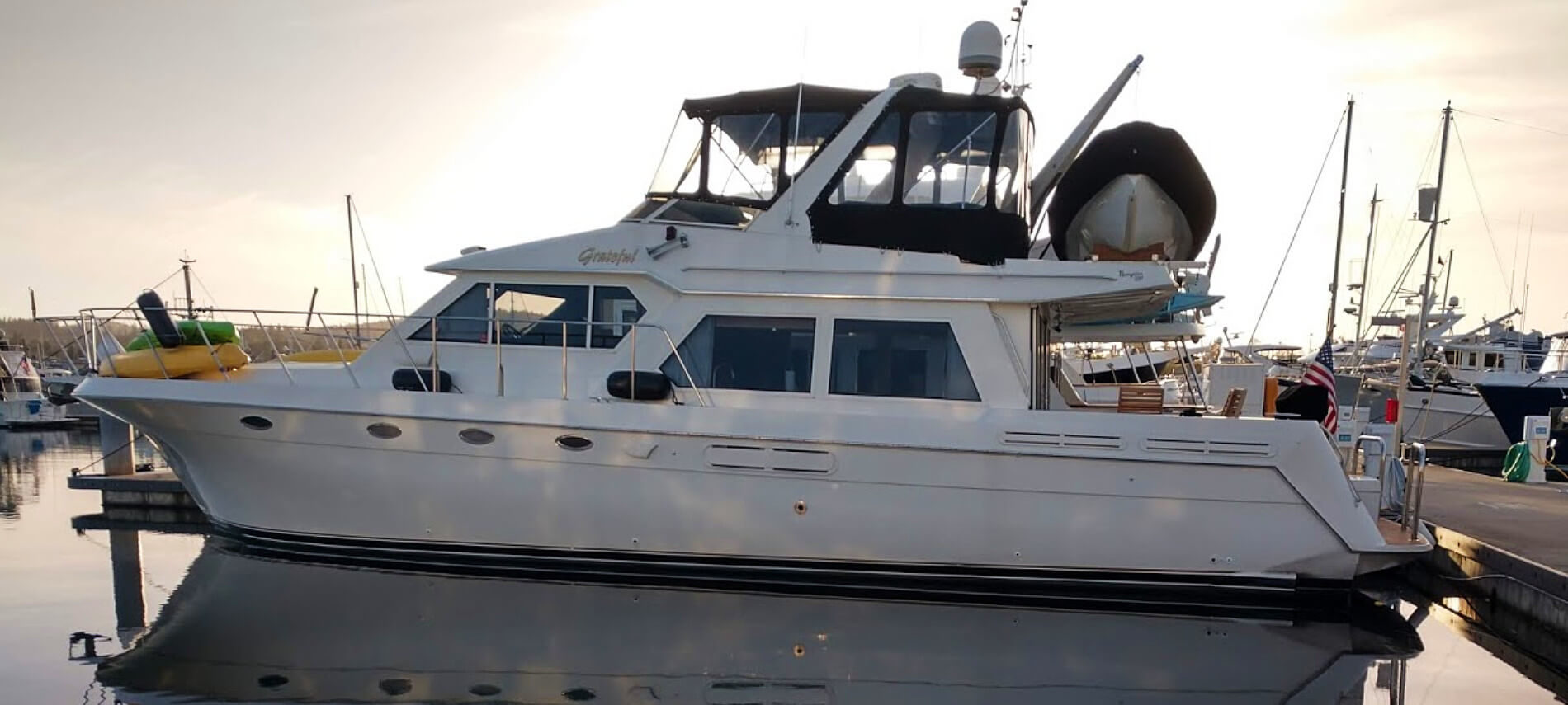 Large white boat at harbor in the sunset